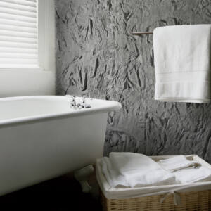 interiorismo baño arenisca gris