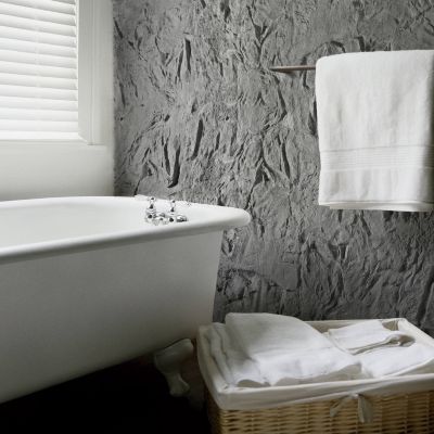 interiorismo baño arenisca gris