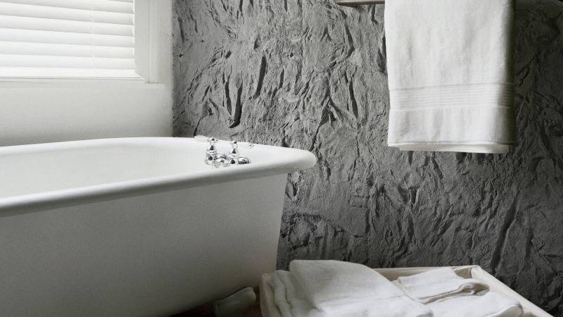 interiorismo baño arenisca gris